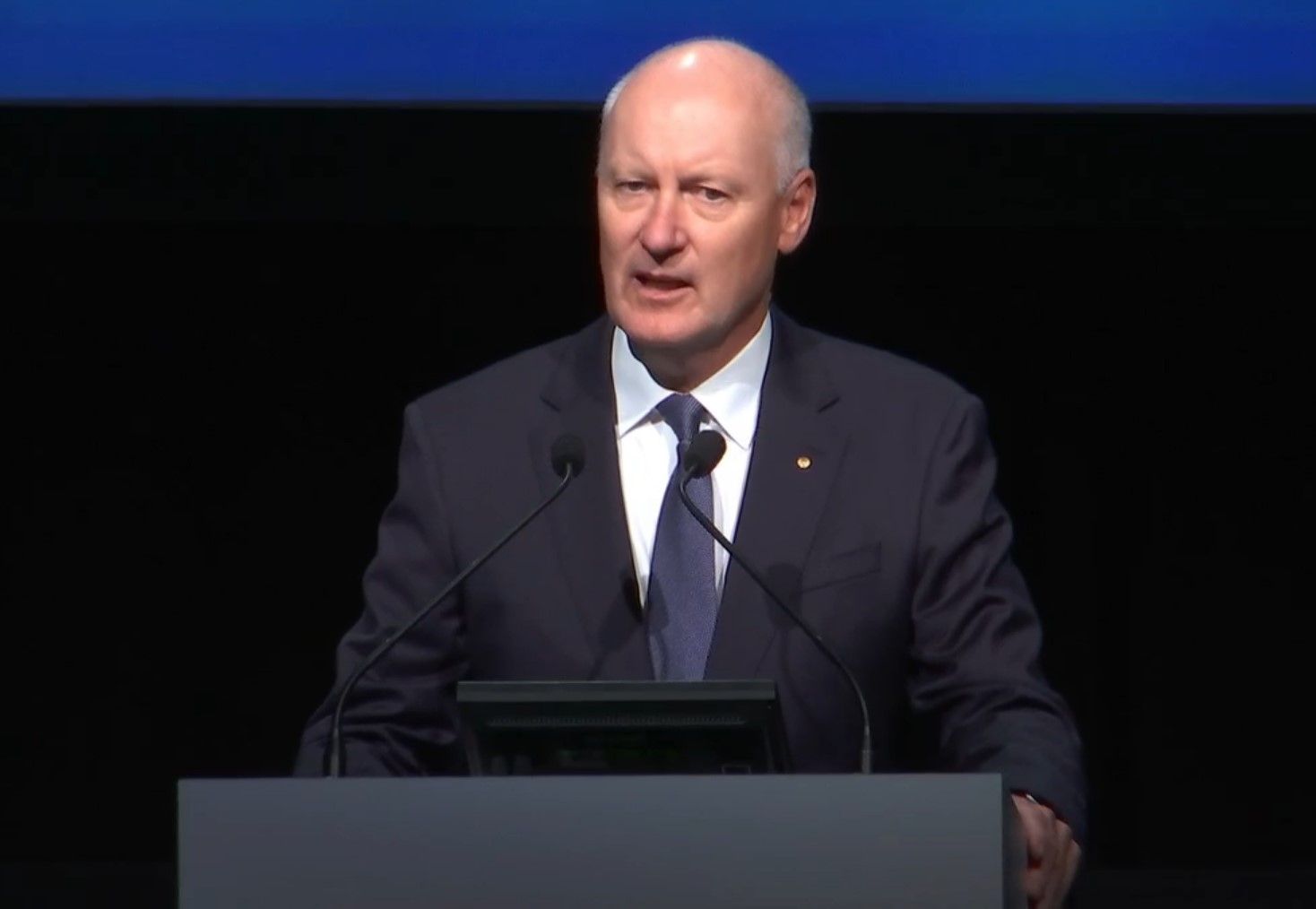 Woodside chair Richard Goyder addresses the 2021 AGM.