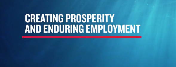 Screenshot of a June Woodside advertising video: "Part of a better future" with text "creating prosperity and enduring employment."